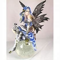 fee_sur_boule_grand_modeles_24cm